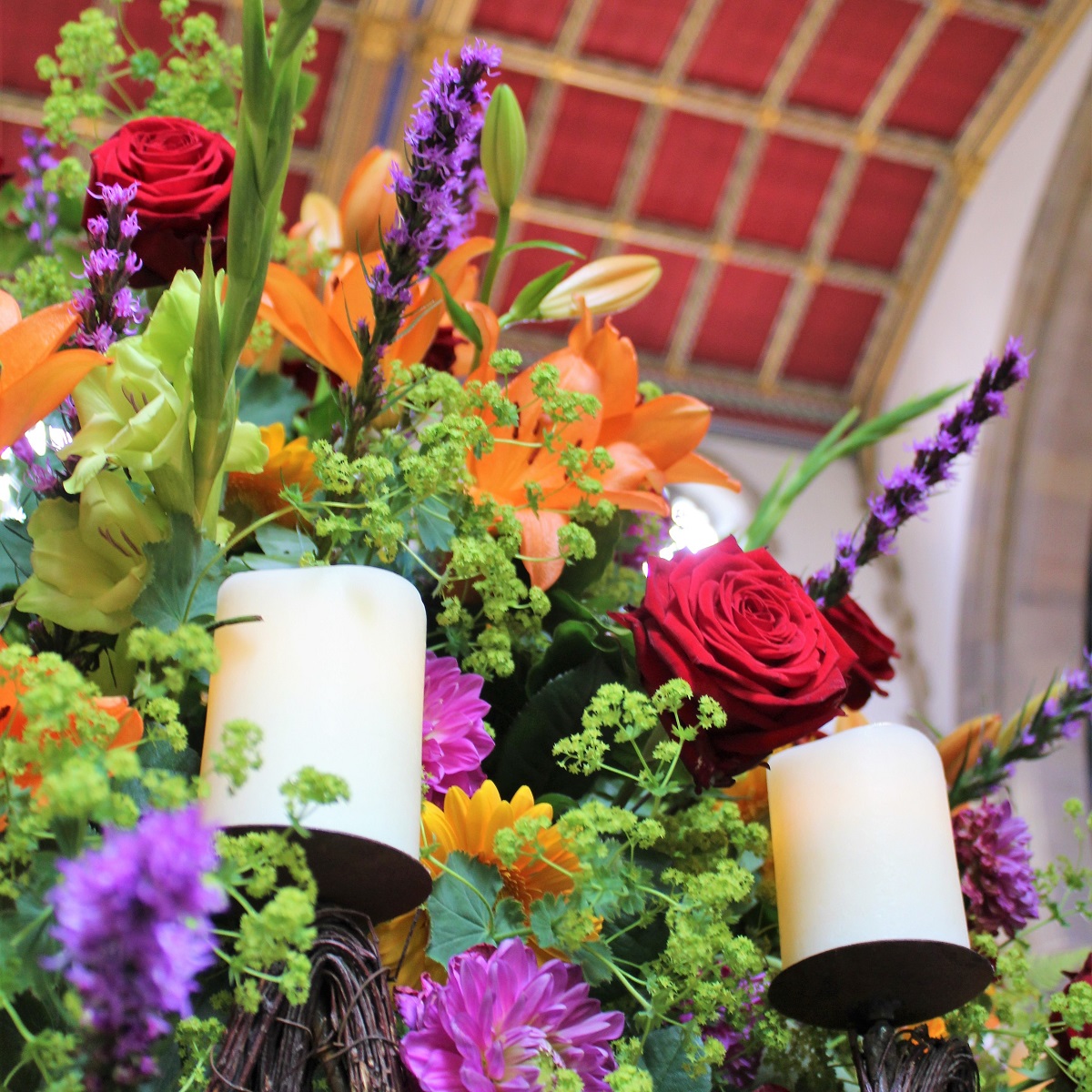 Arrangement of Church Flowers and candles